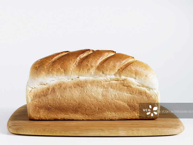 切菜板上的面包，特写图片素材