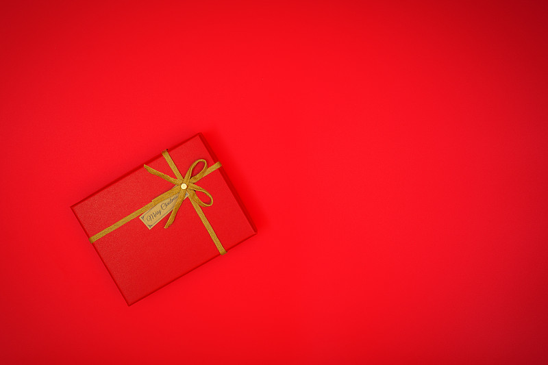 红色背景的圣诞礼盒图片下载