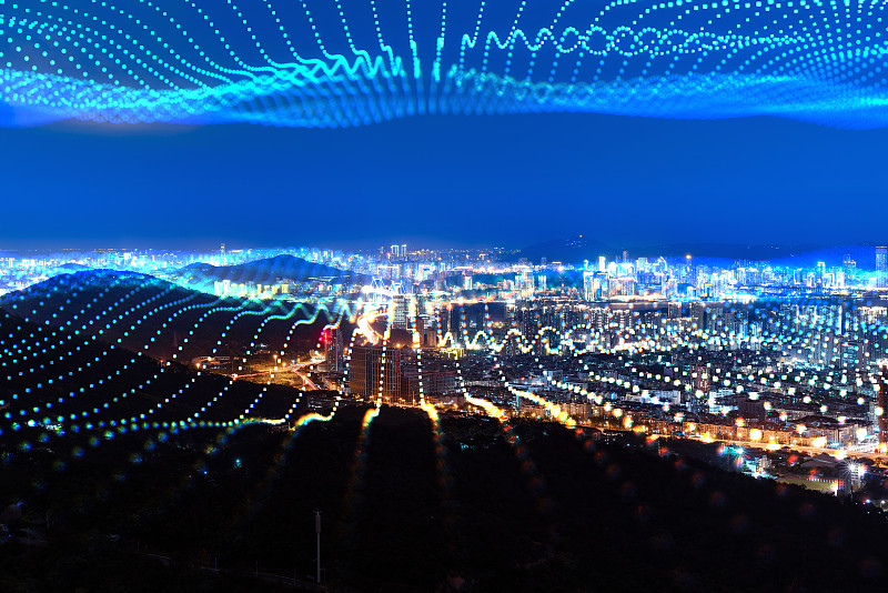 科技线条粒子合成的蓝调城市天际线图片下载