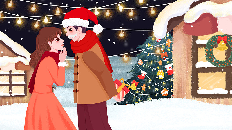 圣诞节在雪地中送礼物的情侣图片下载
