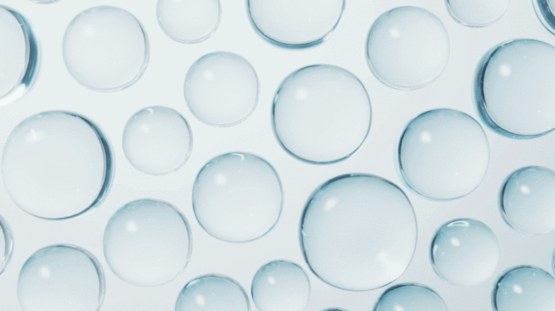 透明水珠球体护肤品概念背景3D渲染图片下载