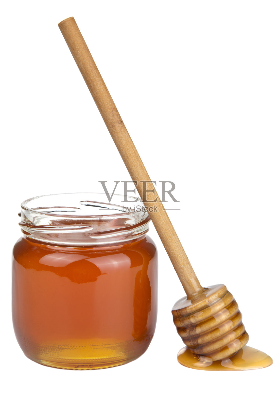 蜂蜜在罐子和勺孤立照片摄影图片
