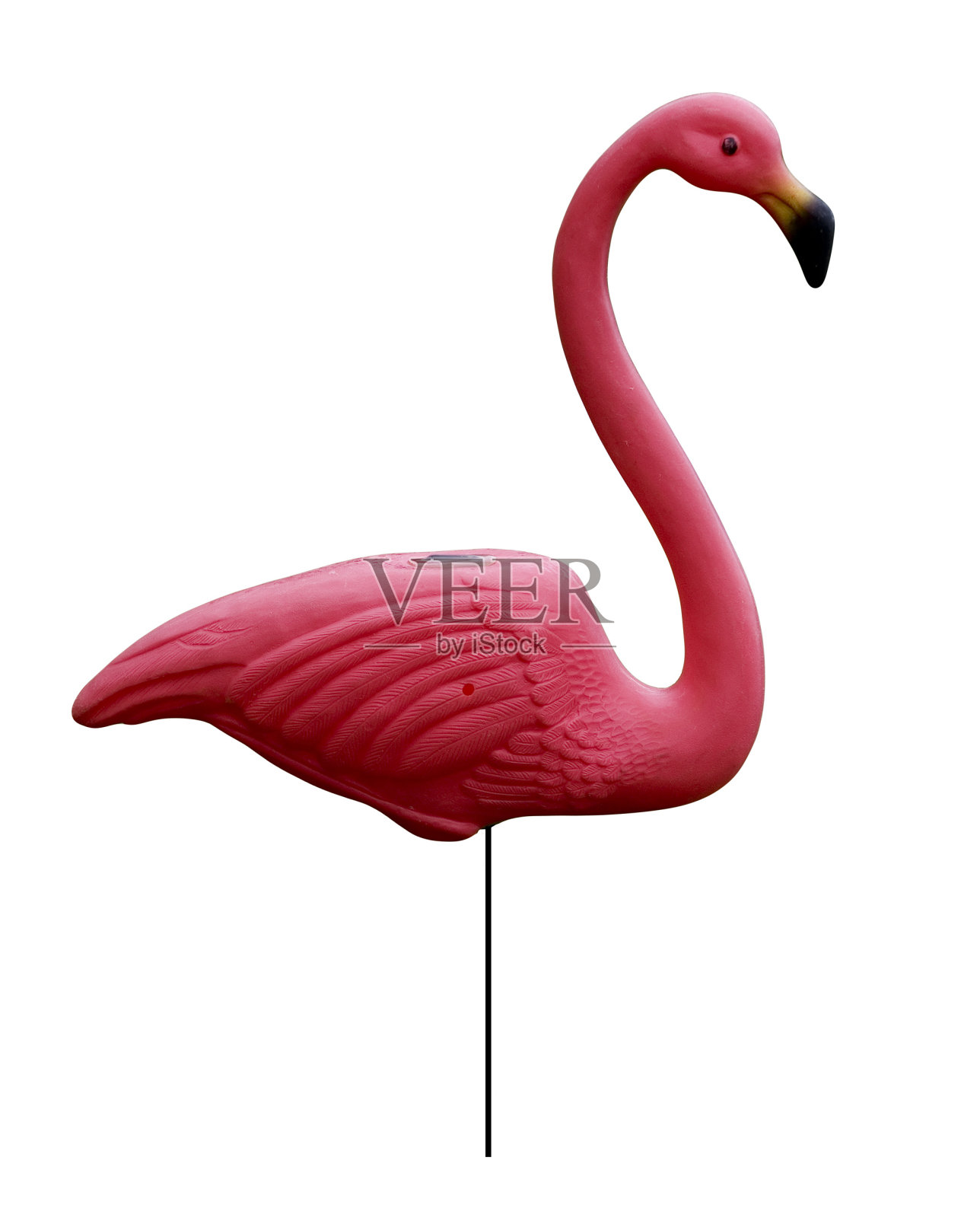 白色背景上的粉红色塑料火烈鸟。照片摄影图片