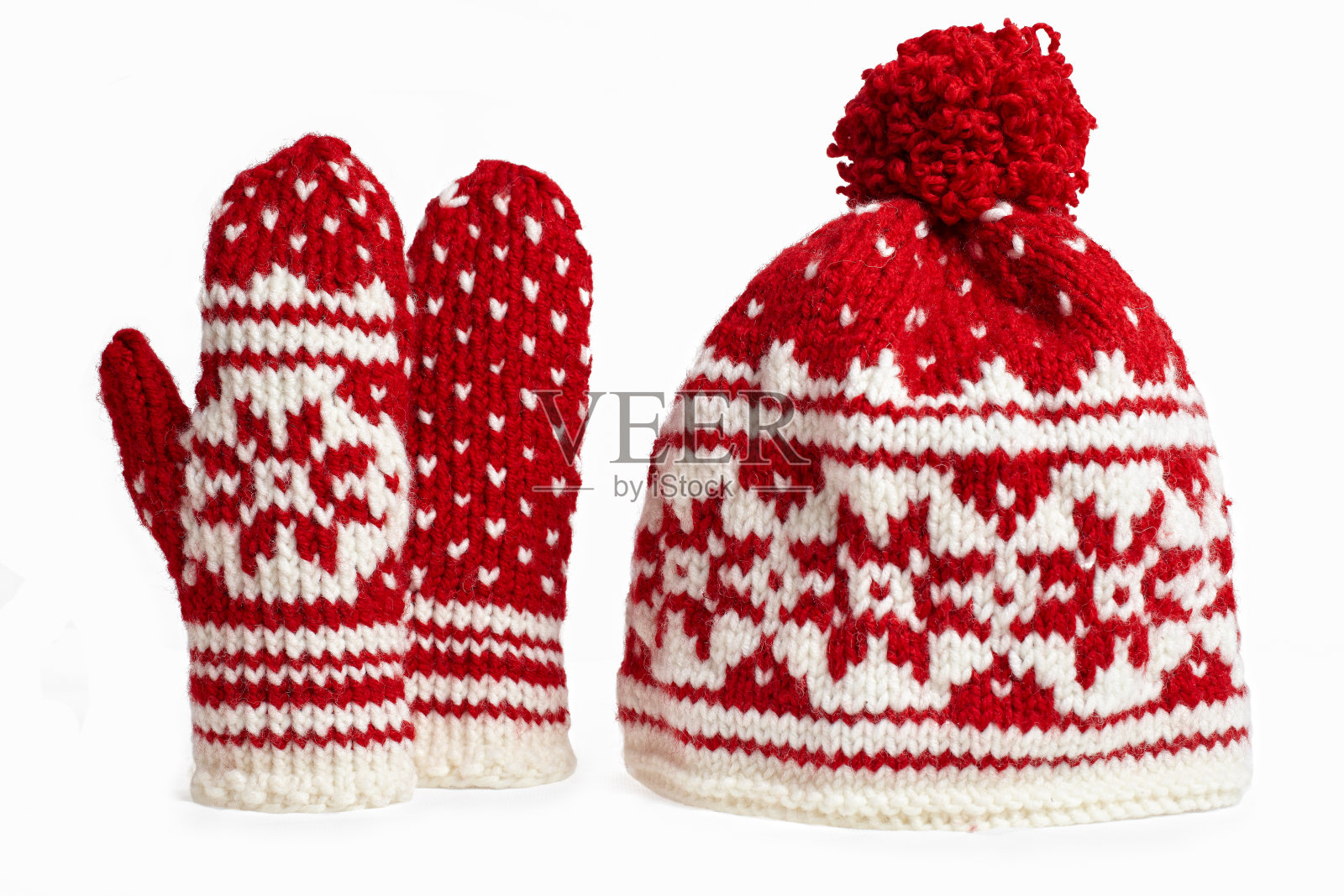 冬季帽子和手套编织的主题。白色照片摄影图片