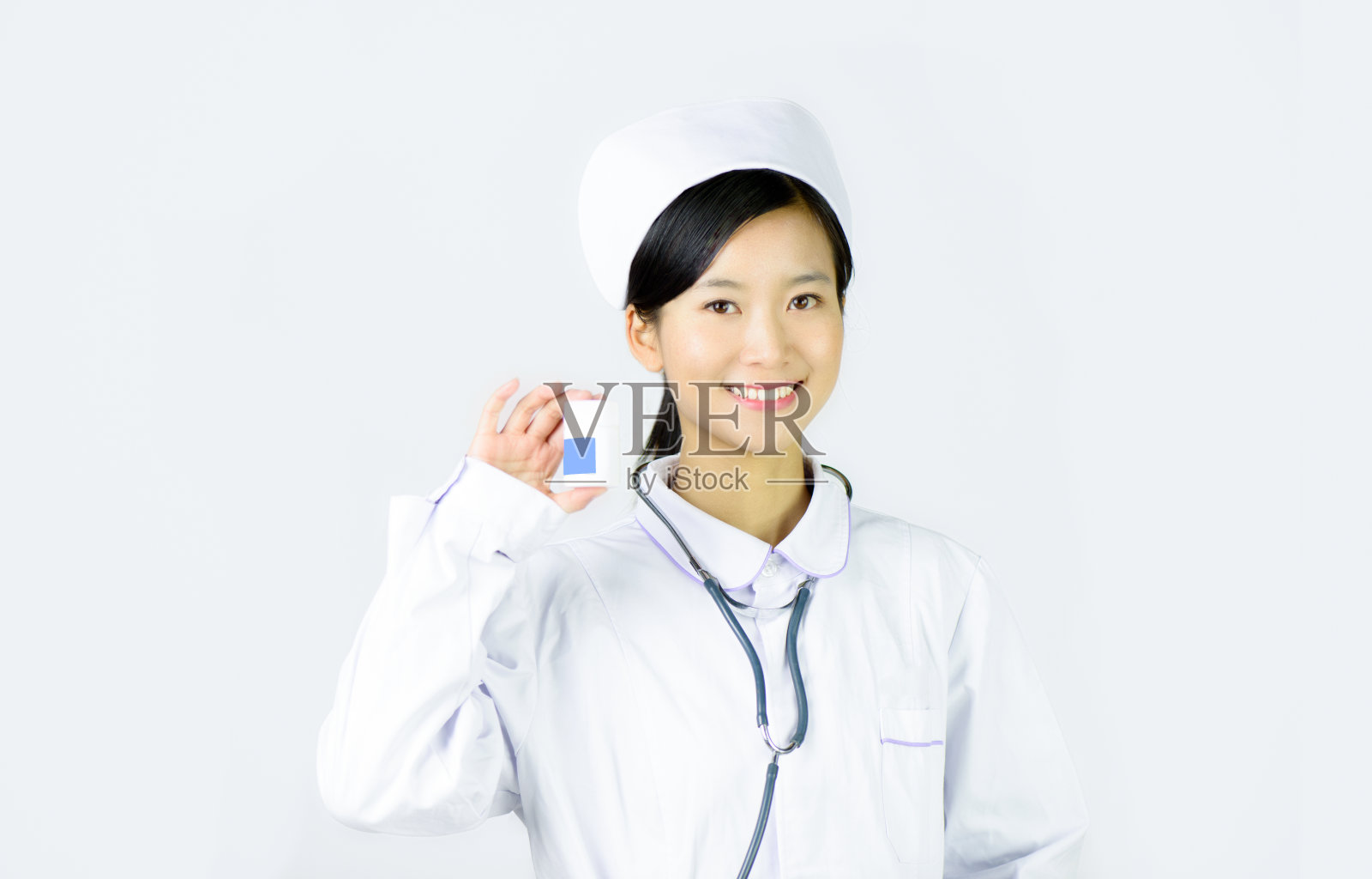 美丽的护士在一个白色孤立的背景照片摄影图片