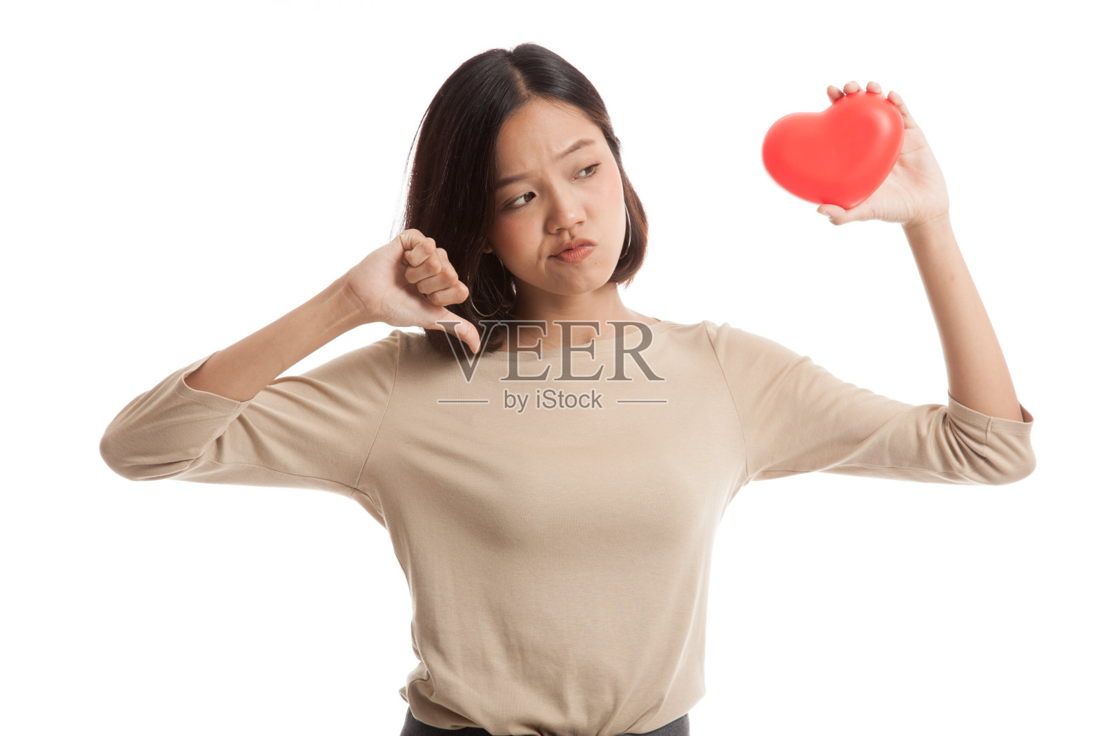 亚洲商业女性拇指与红心照片摄影图片