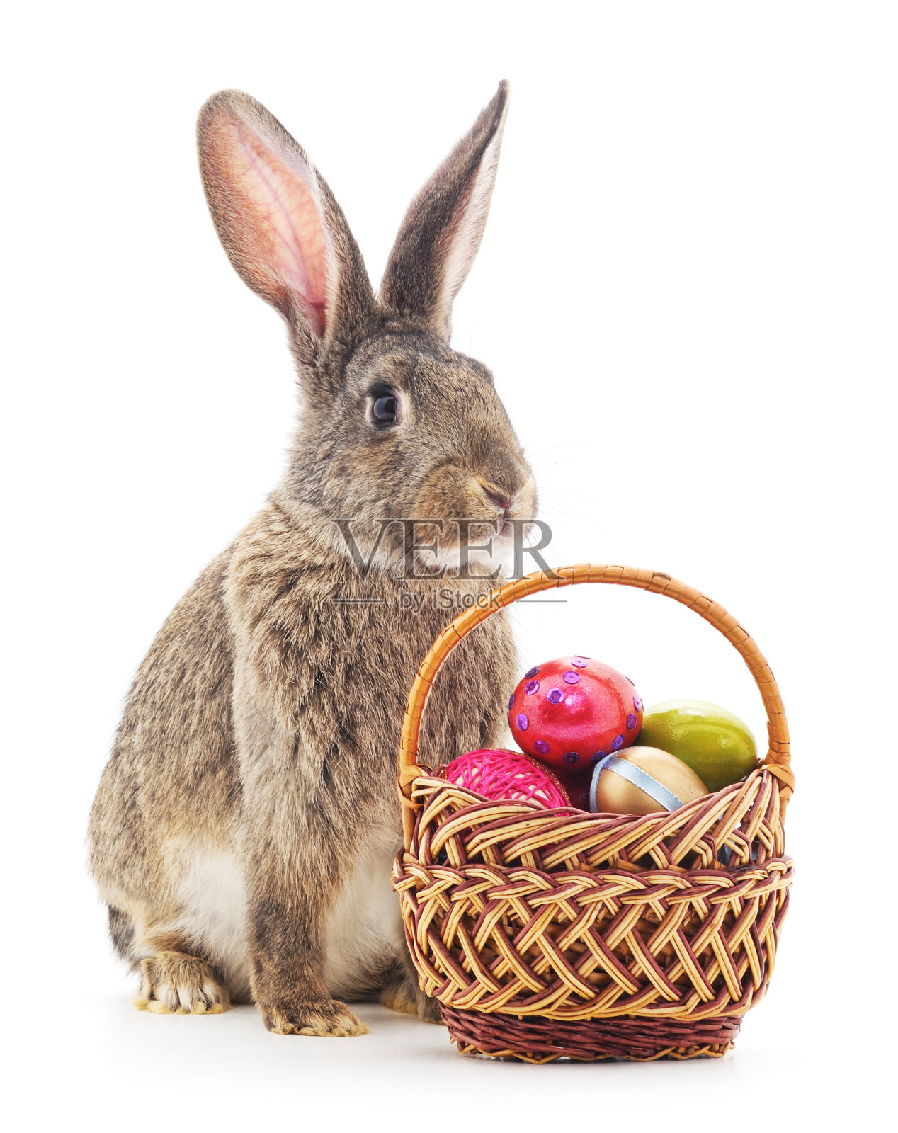 复活节篮子和兔子。照片摄影图片