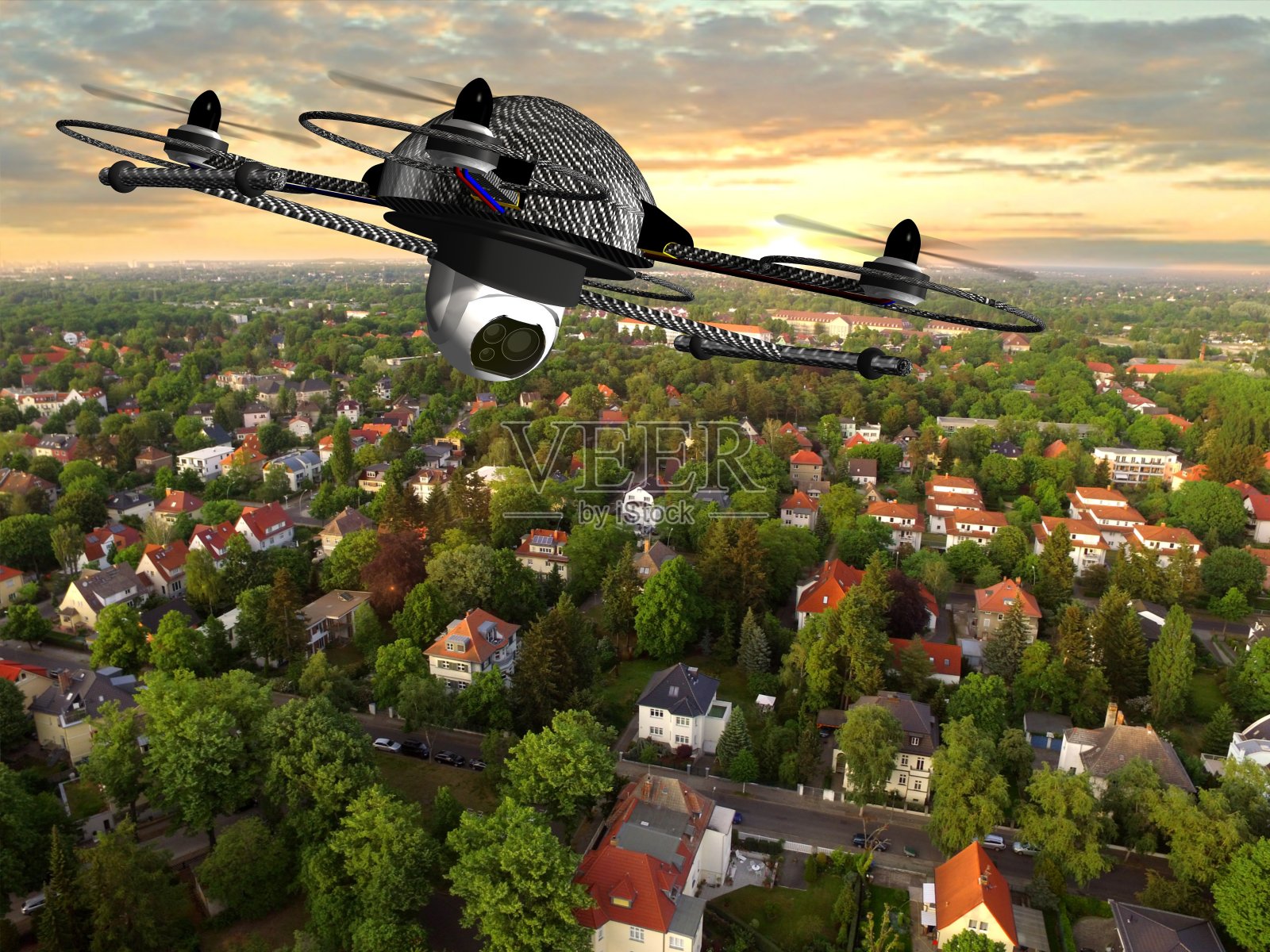带摄像头的无人机在郊区房屋上空飞行照片摄影图片