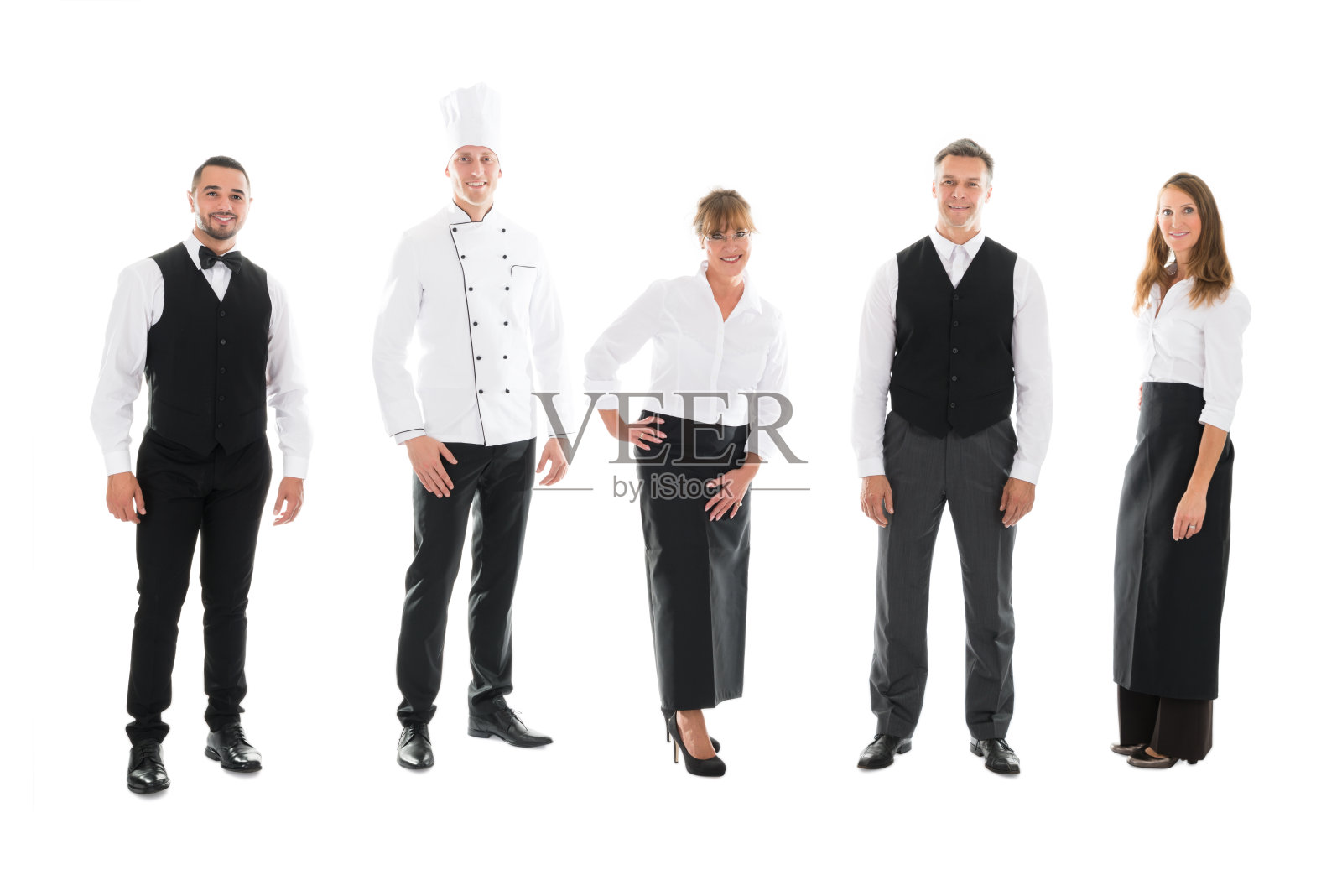 快乐的餐厅员工站在白色的背景照片摄影图片