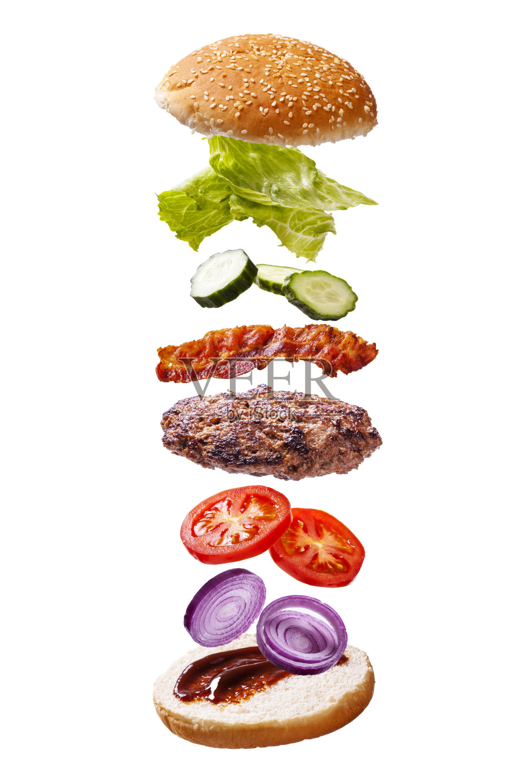 漂浮的牛肉培根汉堡组件在白色的背景照片摄影图片