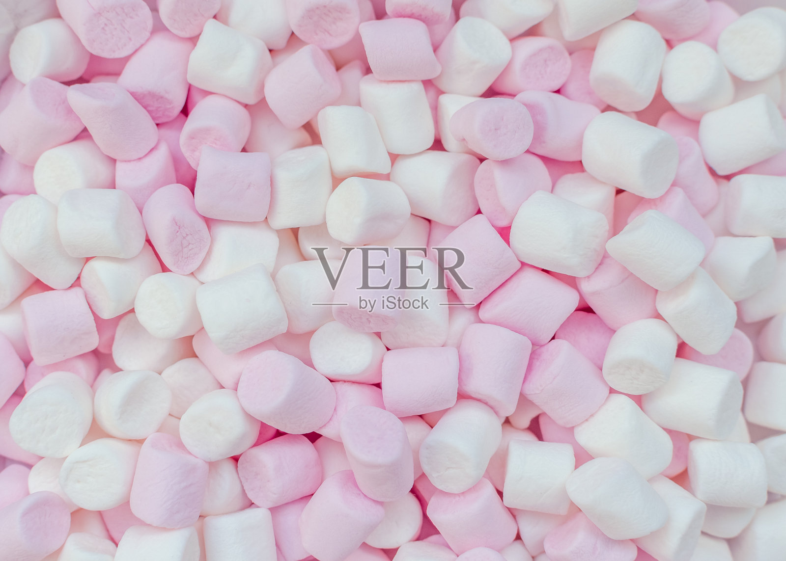 粉红色和白色的迷你棉花糖背景照片摄影图片
