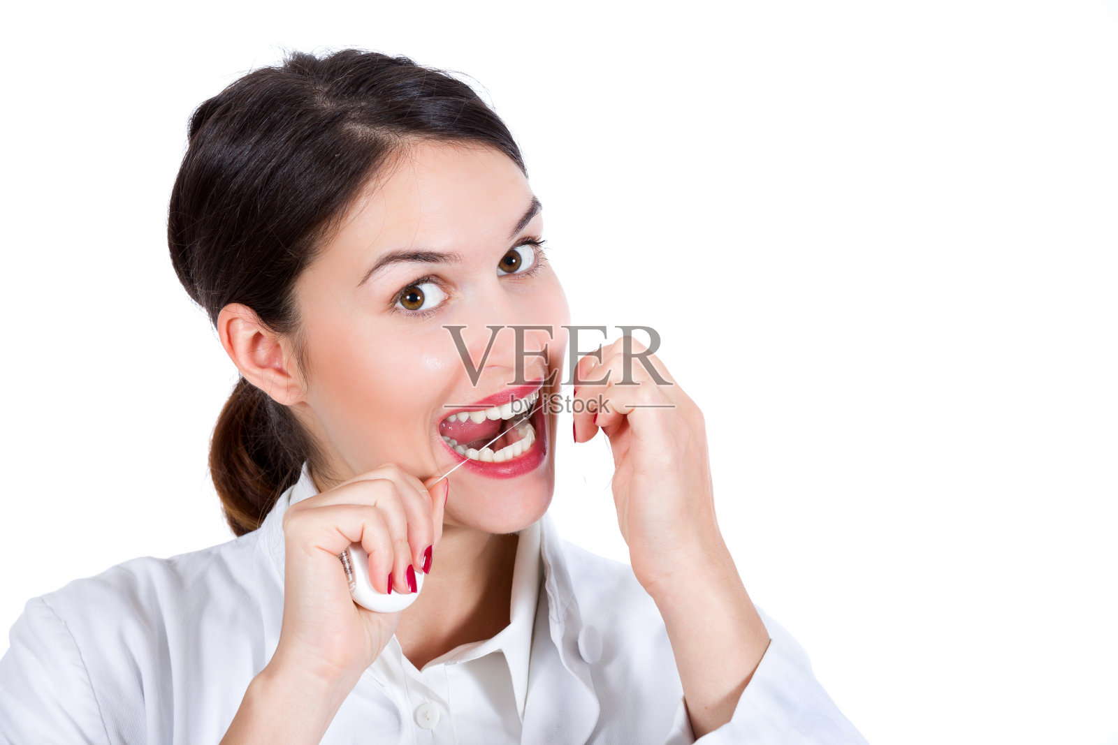 快乐的女人用牙线照片摄影图片