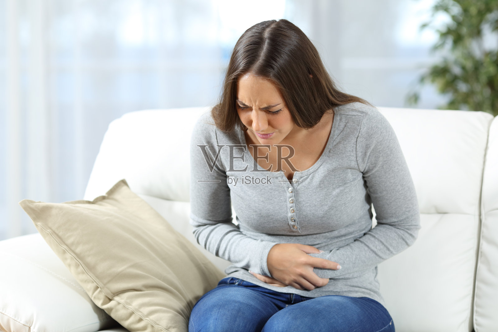 女人胃痛照片摄影图片