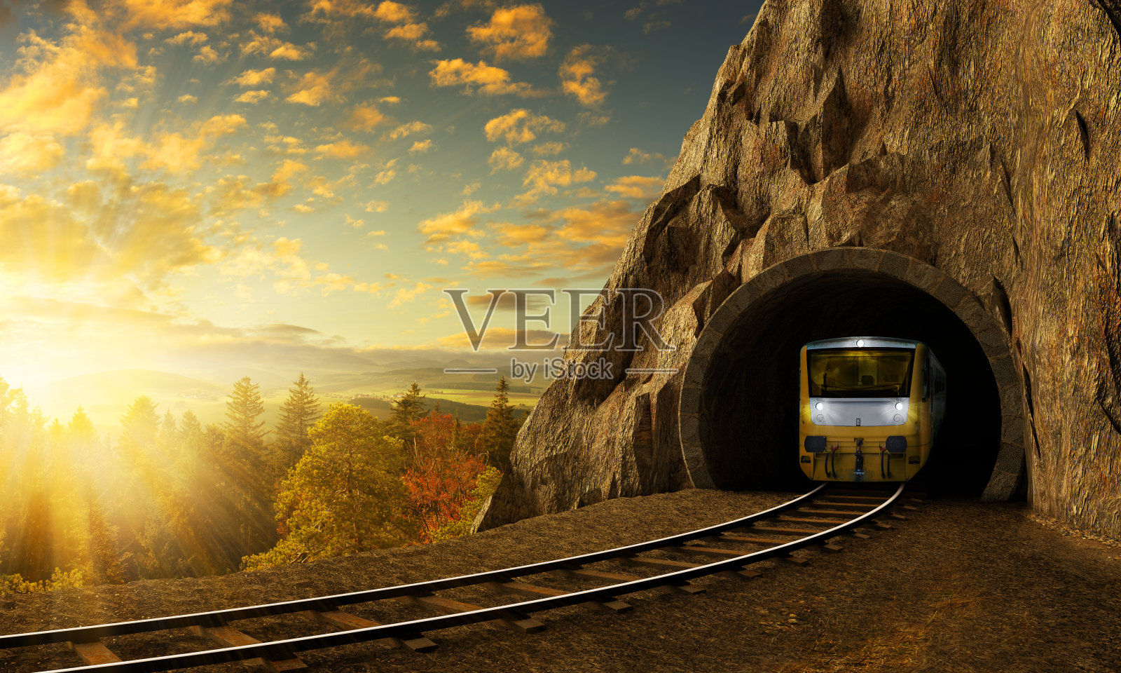 山地铁路与列车隧道在岩石之上的景观。照片摄影图片