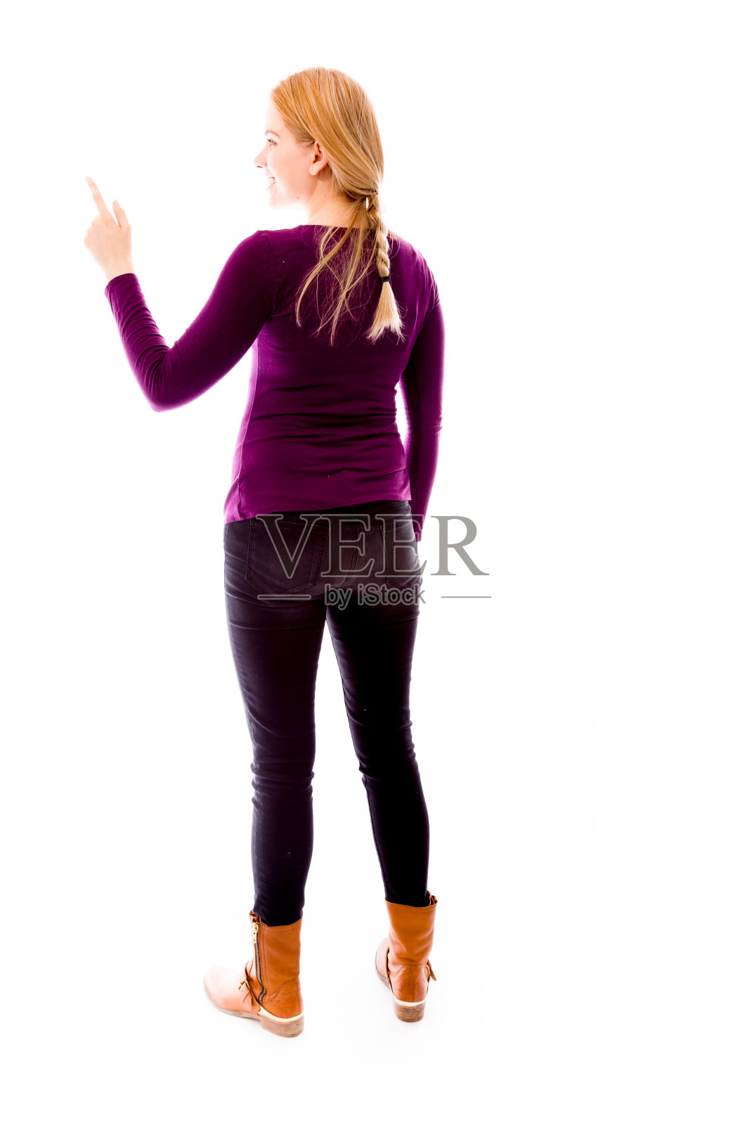 一个年轻女性使用图像虚拟屏幕的后视图照片摄影图片
