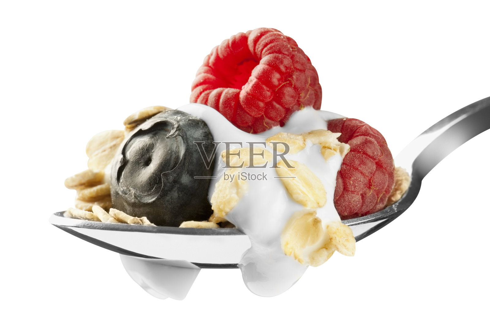 一勺蓝莓，覆盆子，酸奶和燕麦片照片摄影图片