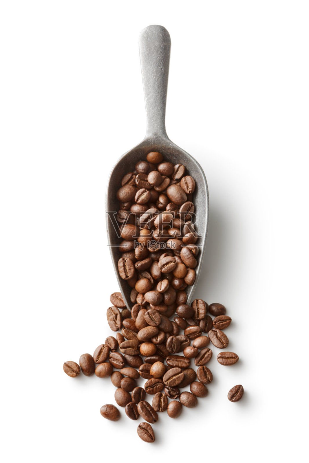 咖啡:咖啡豆在勺子孤立的白色背景照片摄影图片