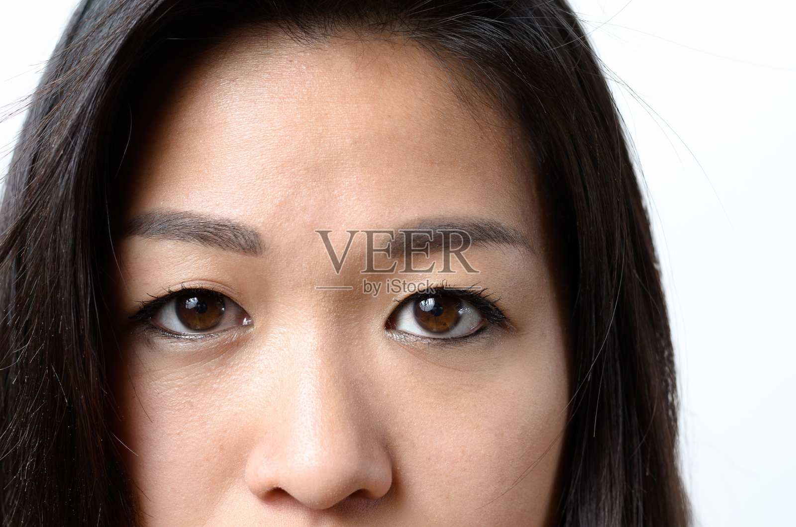 一个年轻亚洲女人的眼睛照片摄影图片