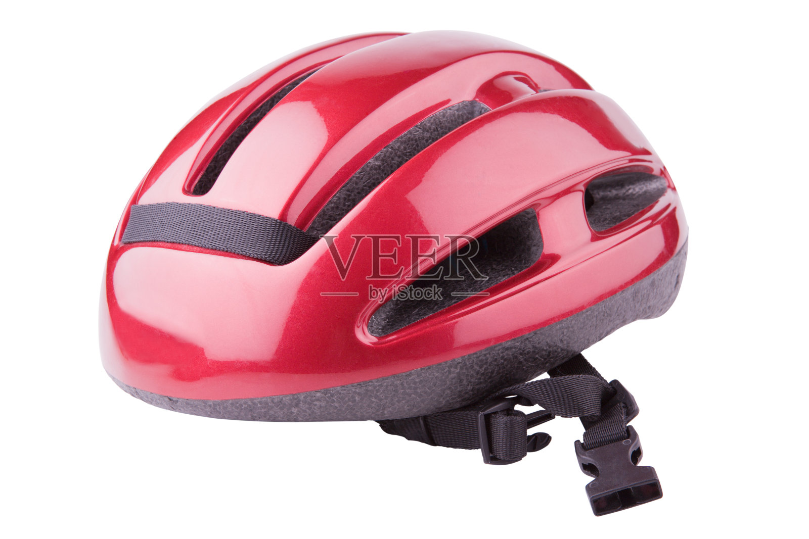 白色背景上的闪亮的红色自行车头盔照片摄影图片