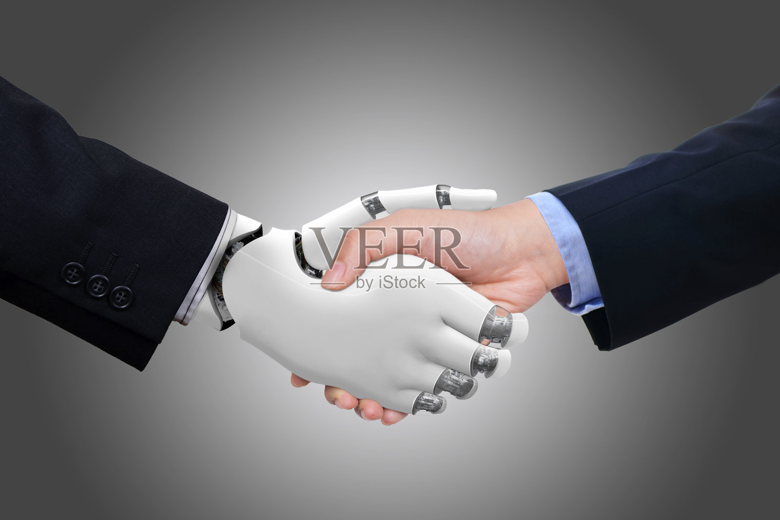 商人与机器人握手照片摄影图片