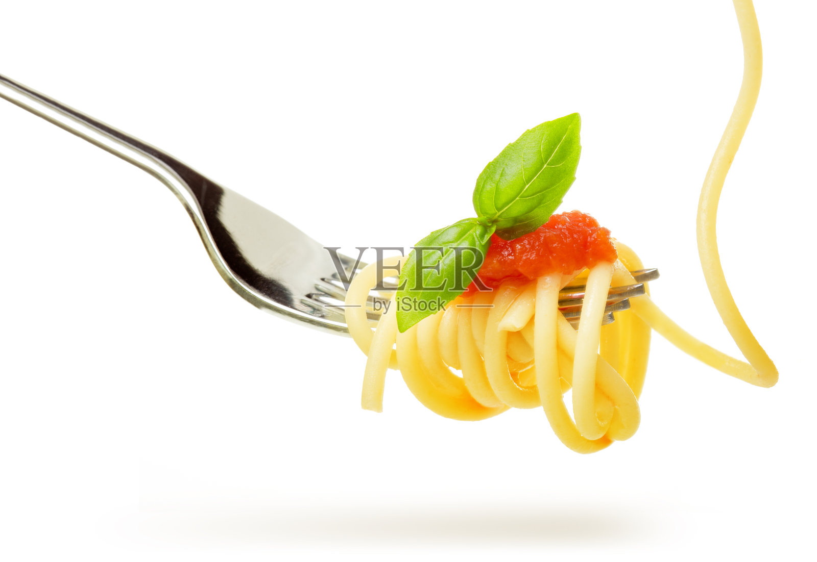 用叉子蘸意大利酱的意大利面照片摄影图片