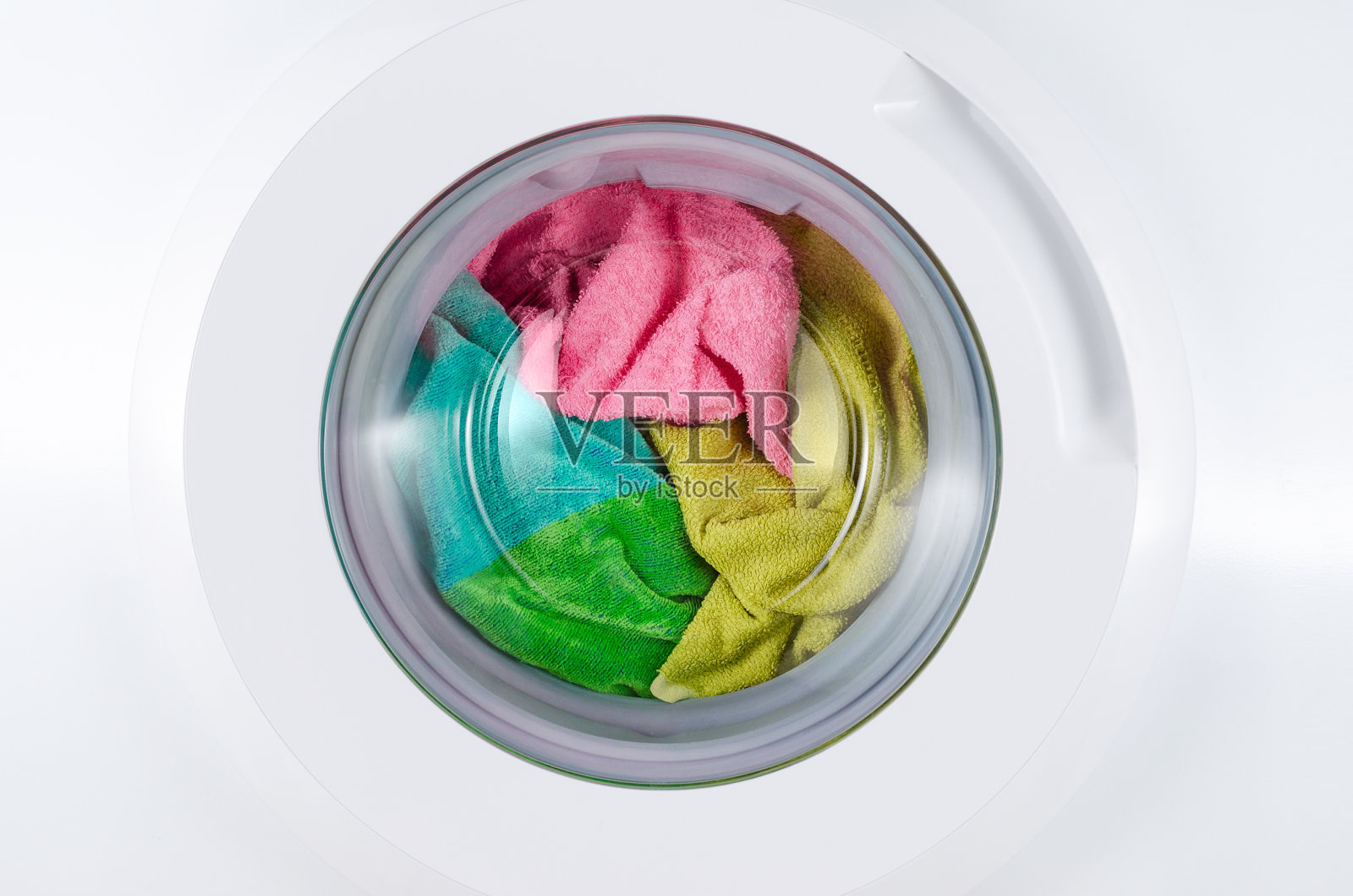 有颜色衣服的洗衣机照片摄影图片