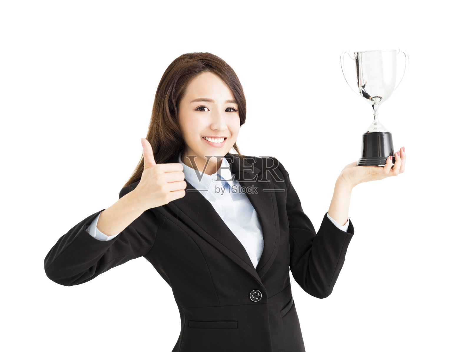 快乐的女商人赢得了奖杯照片摄影图片