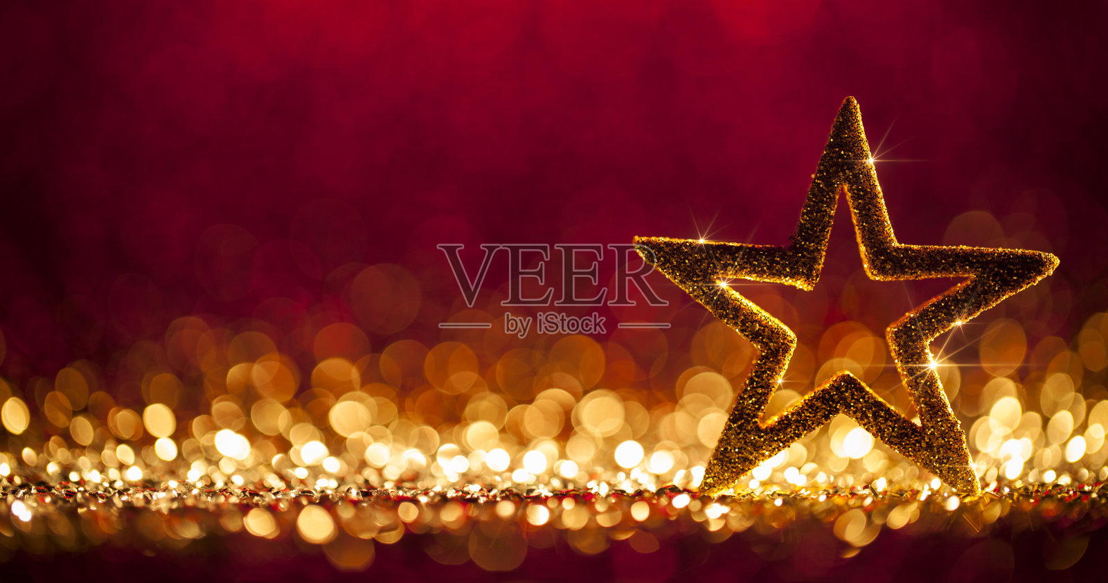 圣诞星-散焦装饰金红色散焦背景照片摄影图片