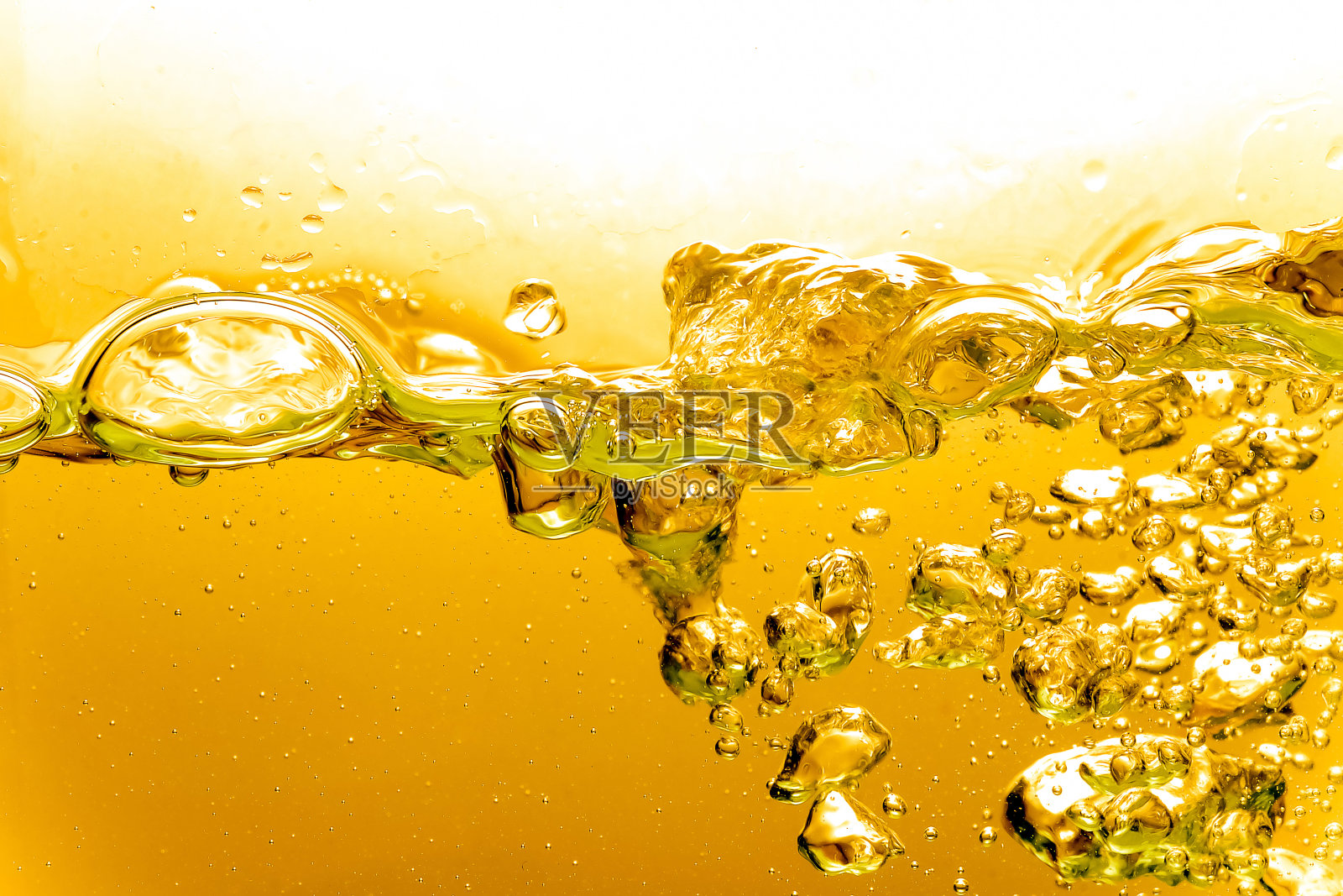 水或油中的液体黄金气泡，美丽的抽象背景照片摄影图片