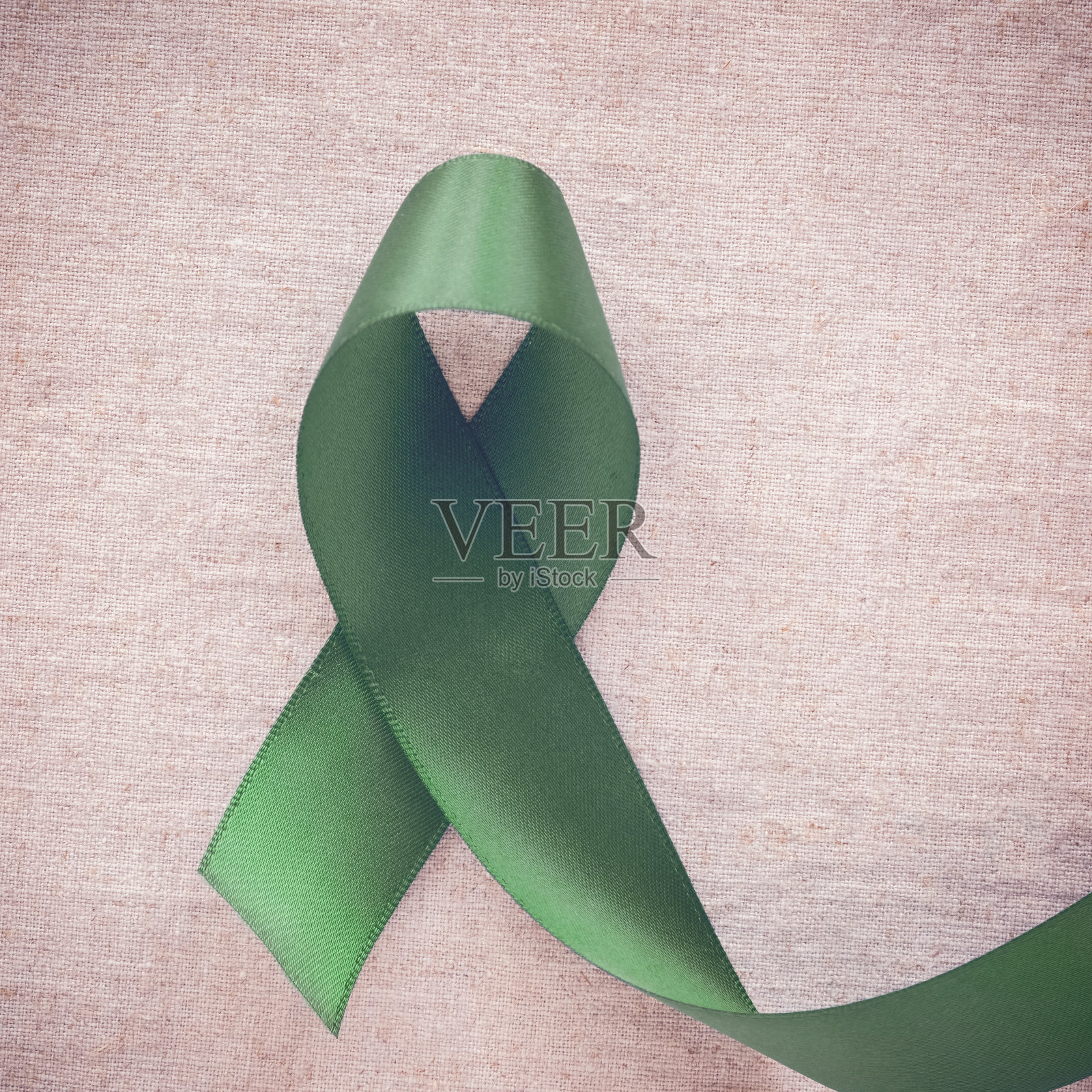 绿色丝带，癌症意识，肝脏，胆囊癌意识，胆管癌意识，乙肝意识照片摄影图片