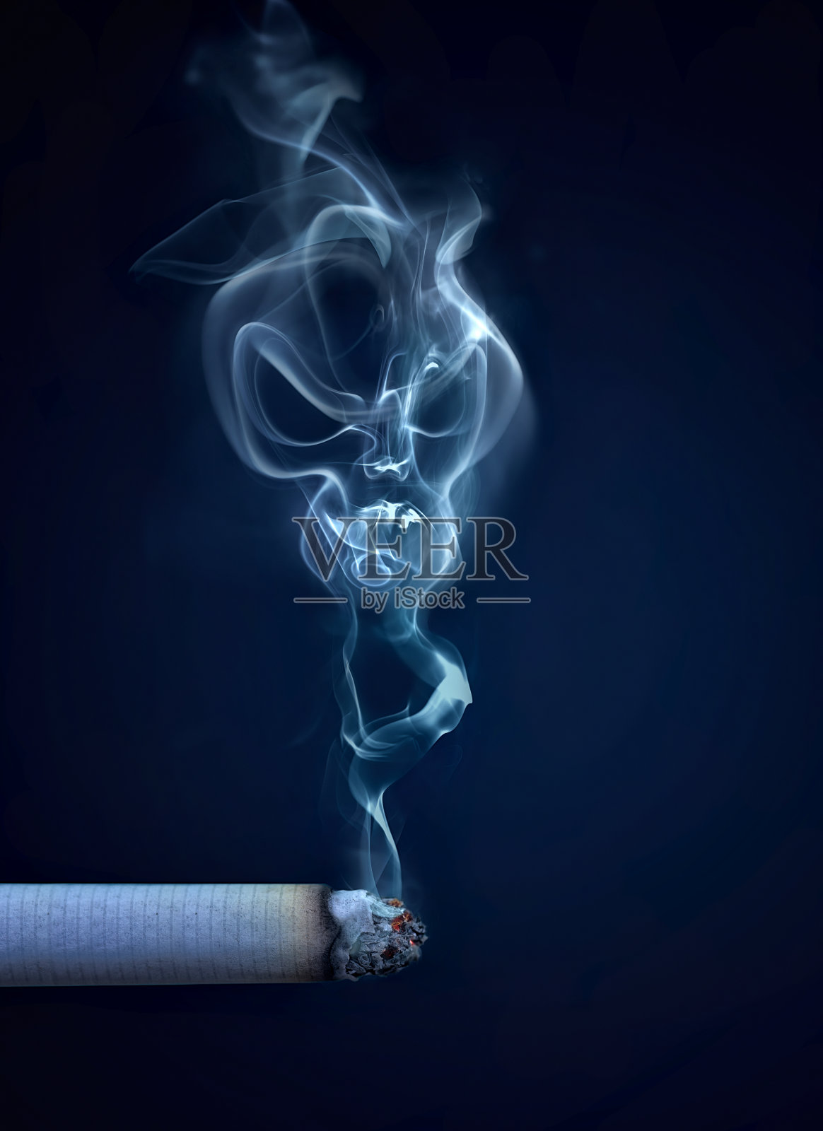 香烟与烟雾呈骷髅状照片摄影图片