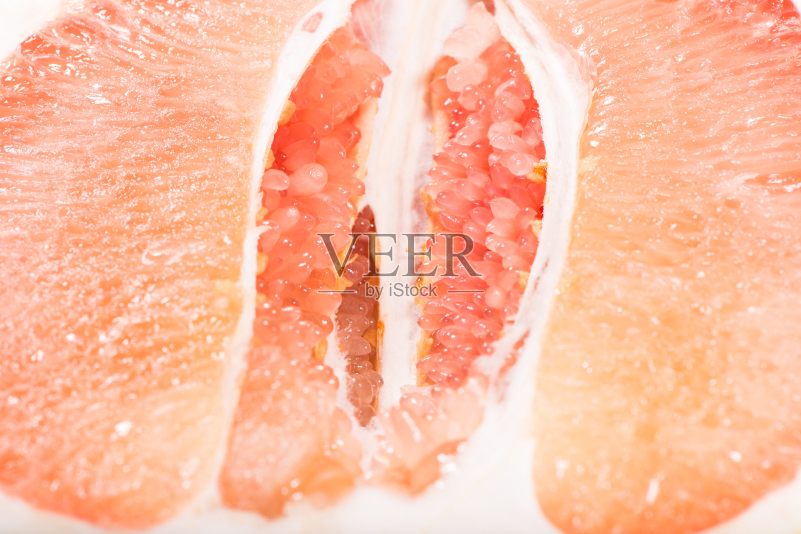 近距离观察柚子果肉。照片摄影图片