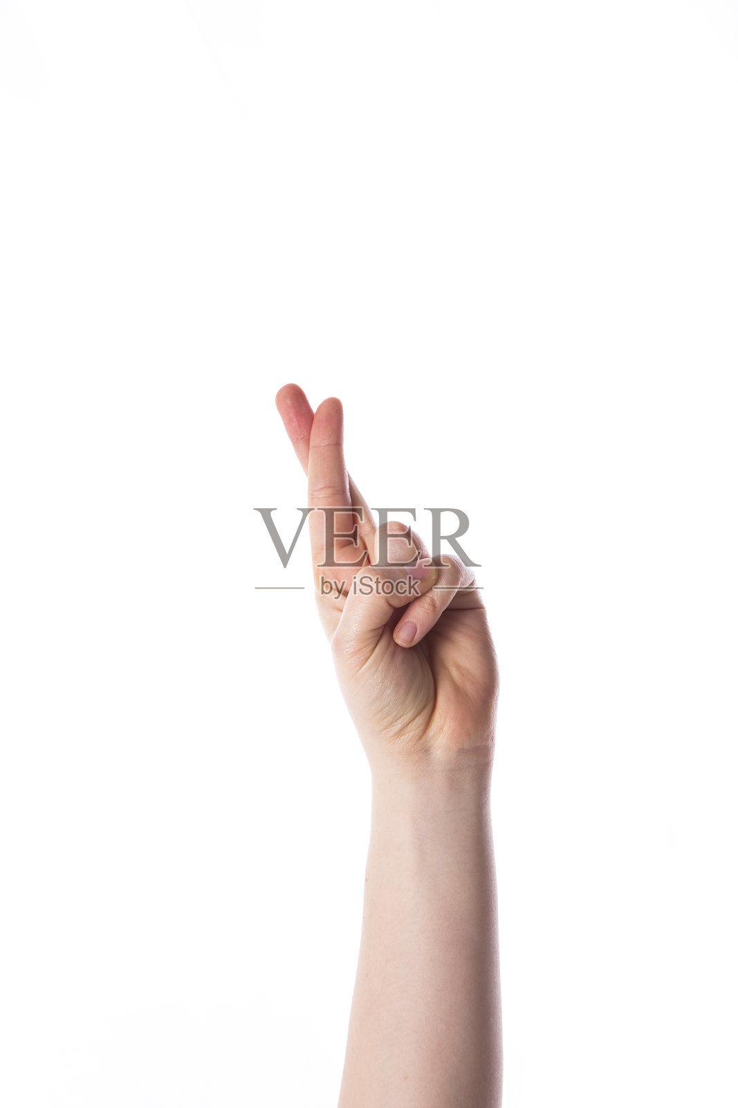 女人的手显示交叉的手指躺在象征孤立的白色照片摄影图片