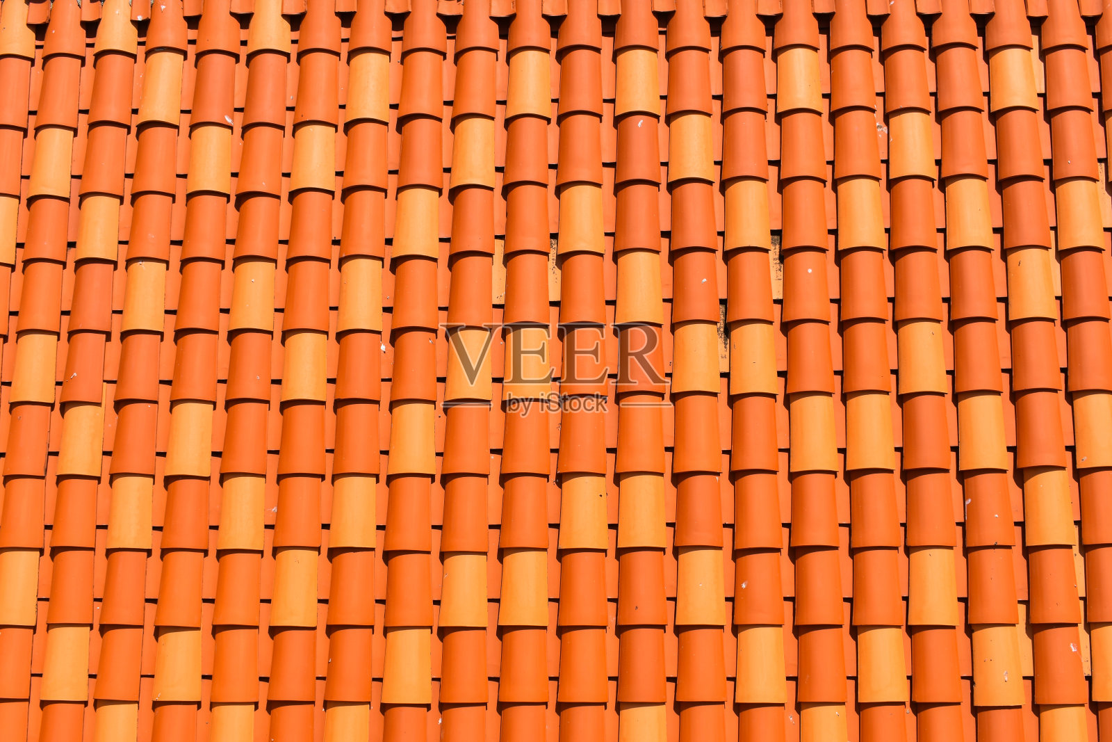 接近橙色和红色的屋顶图案照片摄影图片