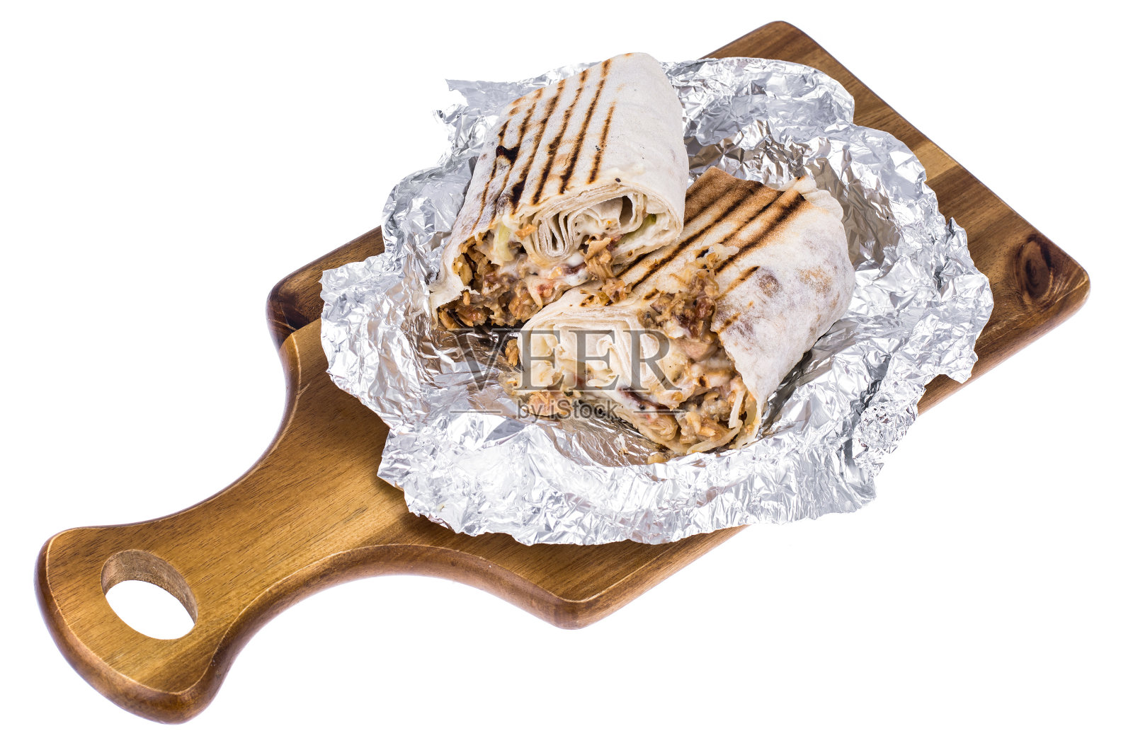 热腾腾的沙瓦玛卷配上芝士、肉和酱汁照片摄影图片