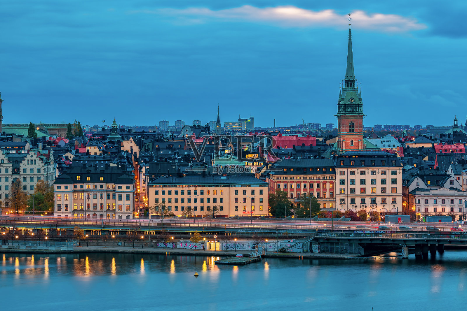 斯德哥尔摩老城格拉斯坦和瑞典的德国教堂的日落景观照片摄影图片