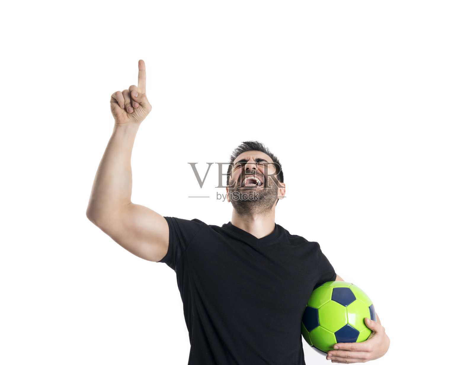 一个人拿着足球在胜利和喜悦中尖叫照片摄影图片