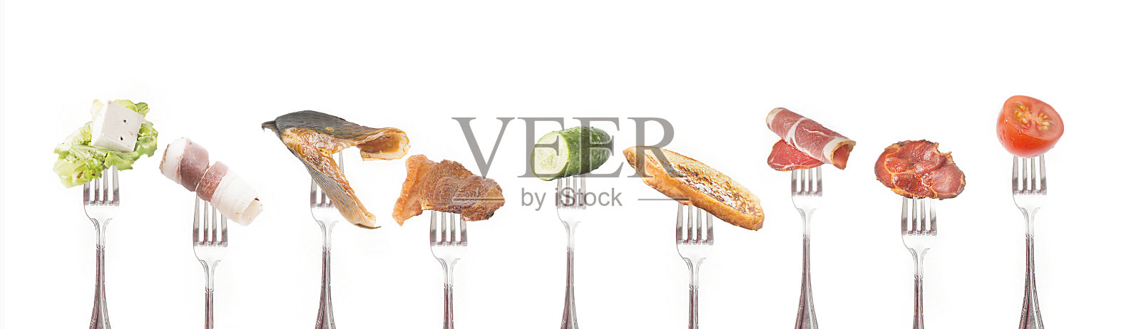 叉子与食物在白色的背景。照片摄影图片
