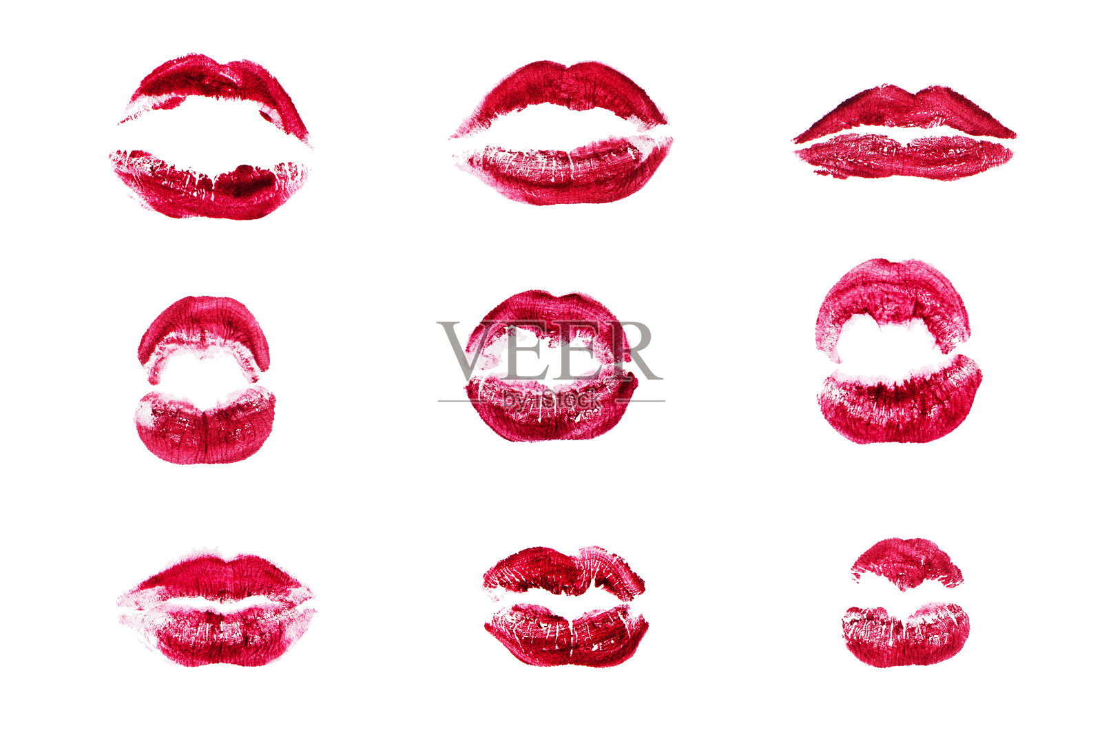 红色唇吻印花设置在白色背景孤立的特写，性感的紫红色嘴唇化妆邮票收集，摄影不同形状的女性粉色亲吻印记，爱的标志，激情的象征，图标照片摄影图片