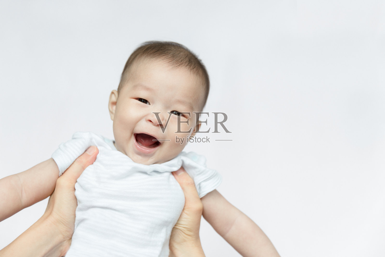 快乐的微笑男婴照片摄影图片