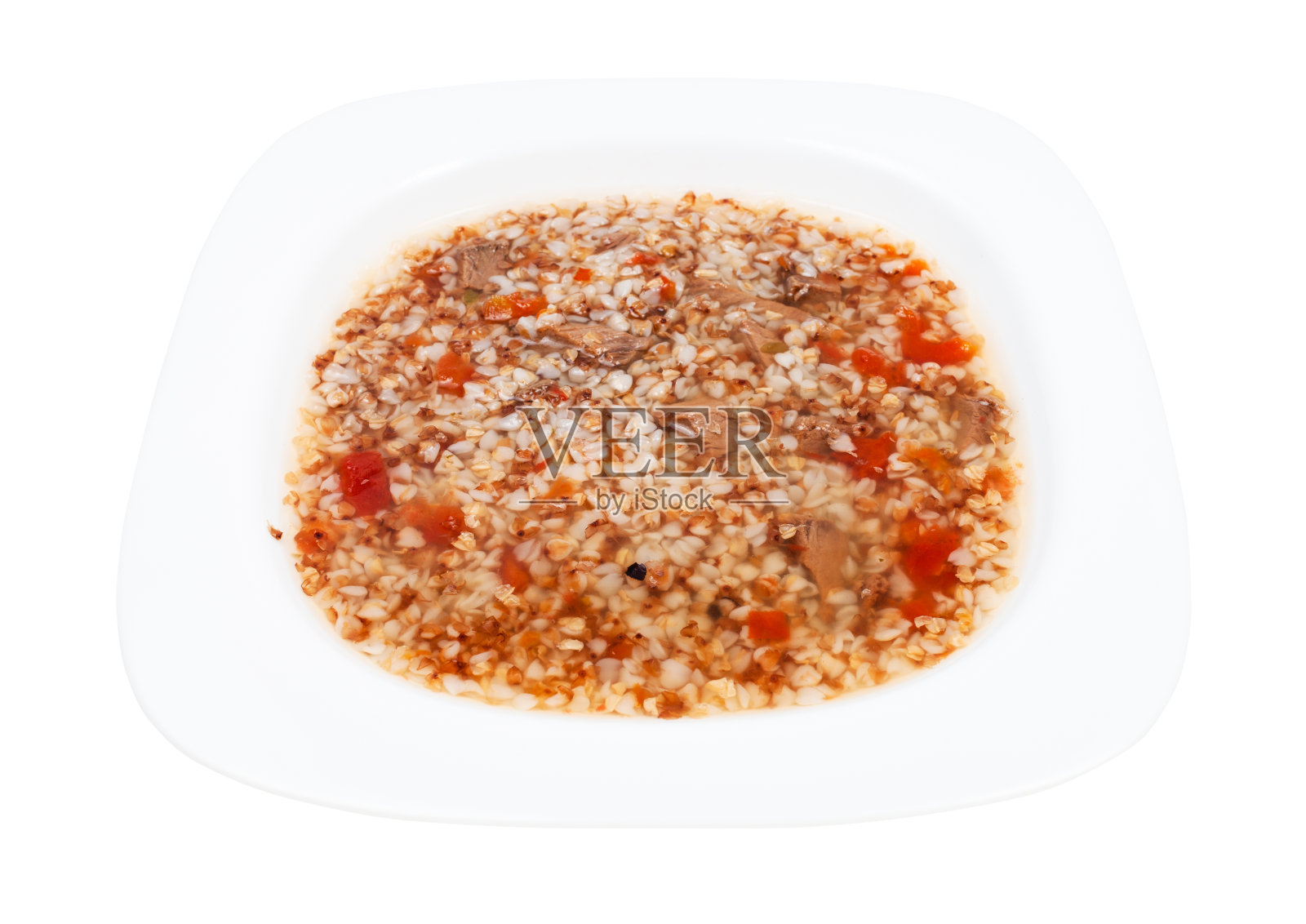肉汤与荞麦在白色盘子孤立照片摄影图片