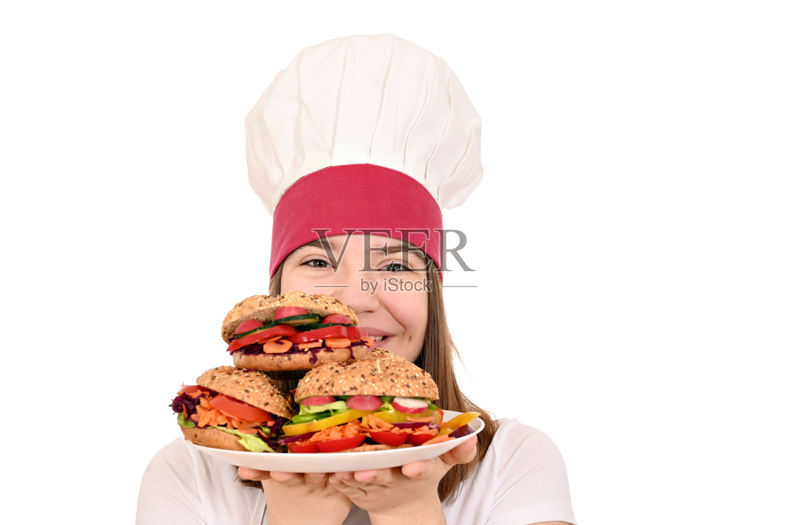 快乐的女厨师用素食三明治照片摄影图片