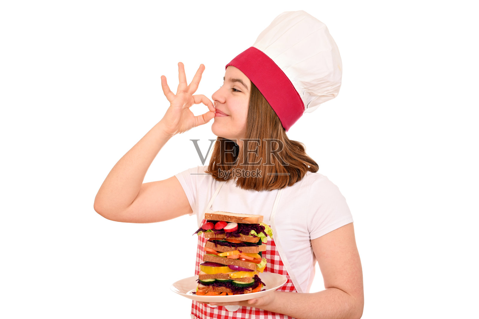 女厨师用蔬菜三明治和ok手势照片摄影图片