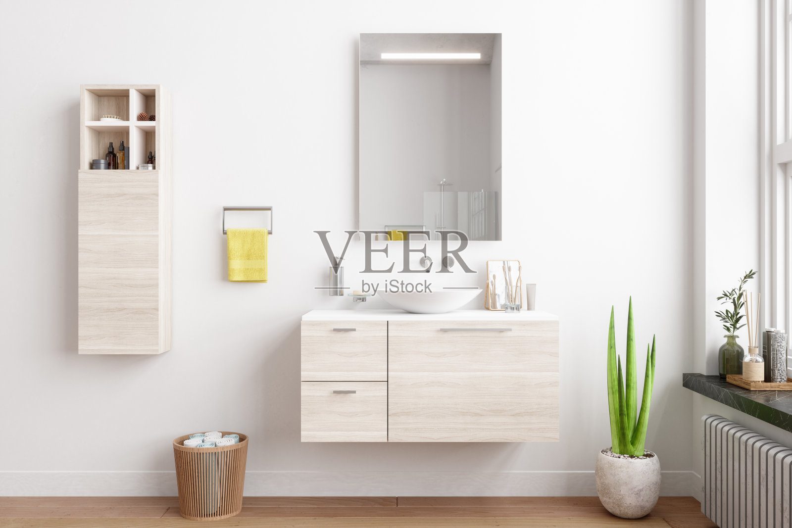 现代浴室木制橱柜，镜子，盆栽植物，和黄色毛巾。照片摄影图片