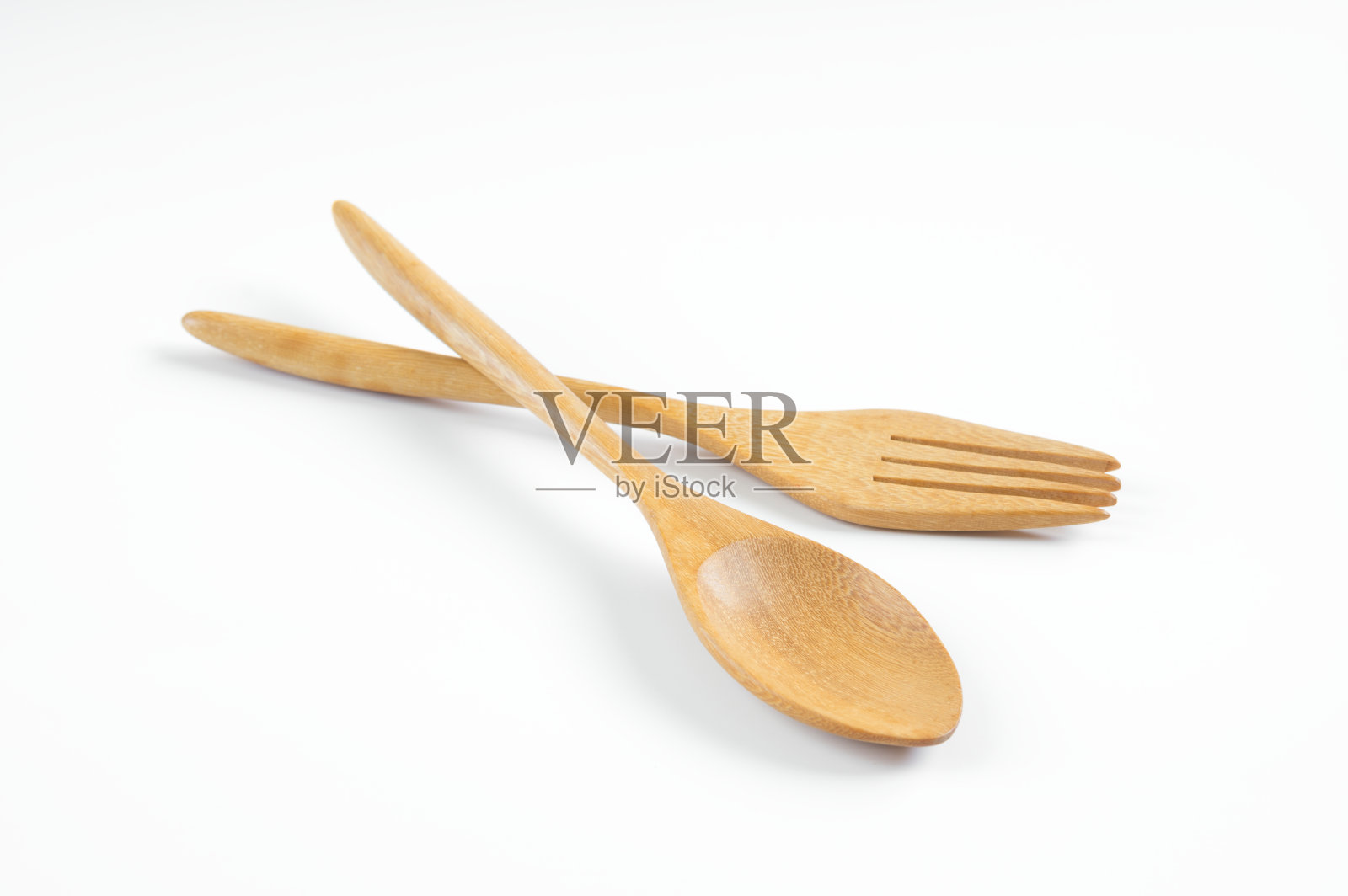 白色的木勺和木叉。照片摄影图片