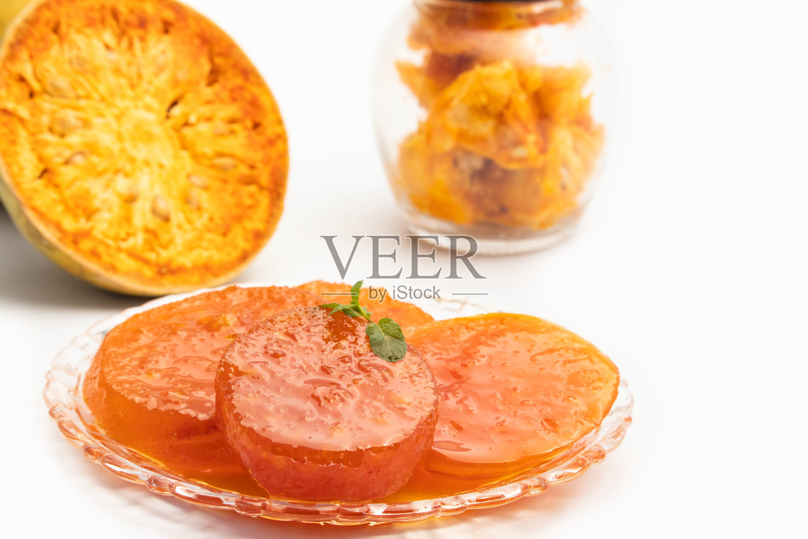 阿育吠陀Bael或Bel Murabba是木头做的苹果或Belgiri Bili Bhel糖和Shahad Madhu。治疗腹部疾病，清肝健肝，调理消化系统，调节肠道运动照片摄影图片
