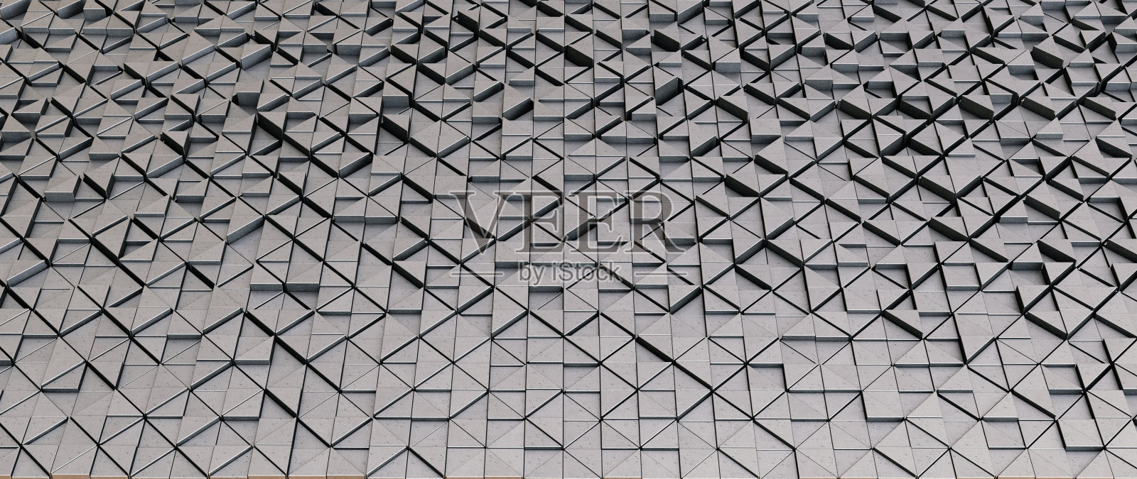 一个抽象的杂乱的背景结构，由3D灰色三角形形状照片摄影图片