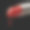 红色融化的口红孤立在黑色的背景素材图片