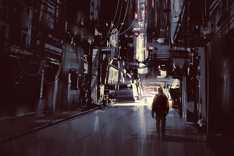 在黑暗的城市里独自行走的人图片