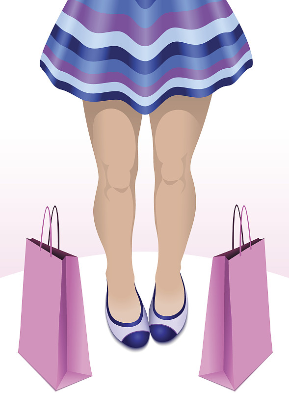 女性苗条的腿与购物袋图片下载